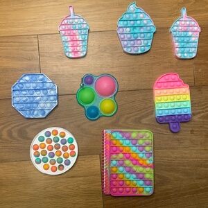 Bundle of 8 Pop-It Fidget Toys Including Notebook